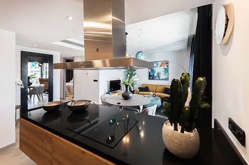 home round white wooden table near kitchen island kitchen
